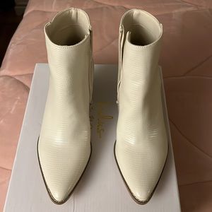 Ivory snake ankle boots in size 6